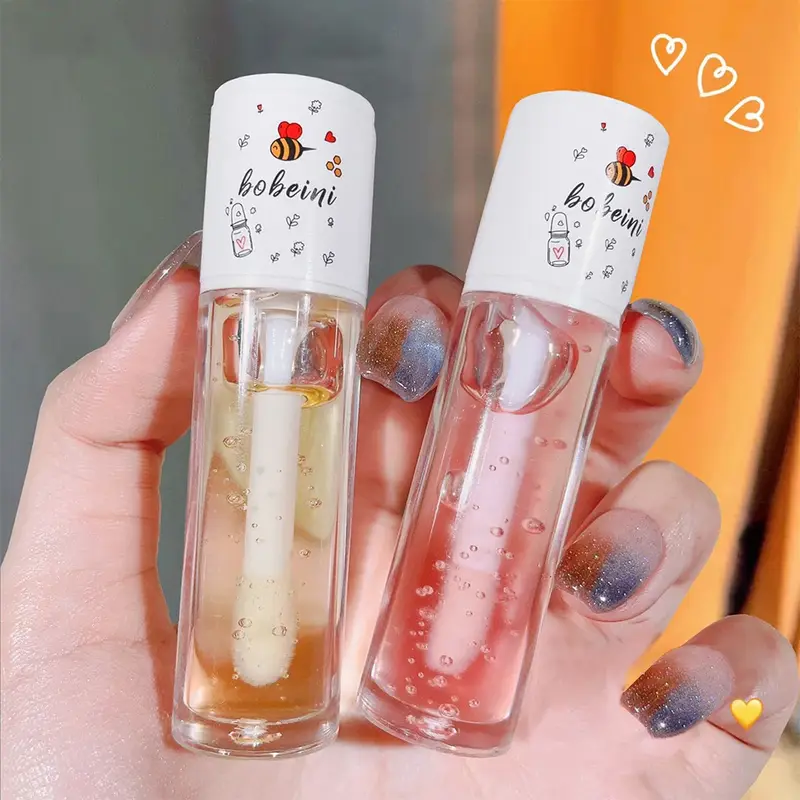 Mézes ajakolaj víz könnyű átlátszó üveg Honey ajak hidratáló ajakolaj hidratáló ajkak diák megfizethető — image 2