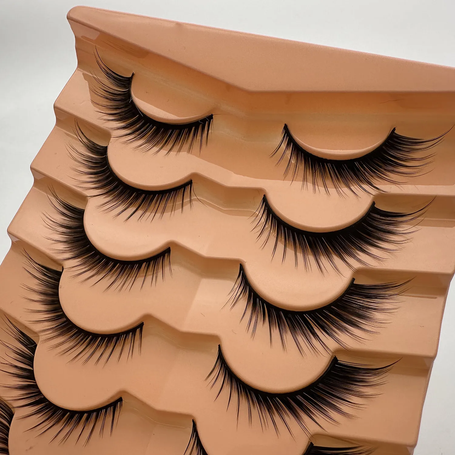 7 pairs of cat’s eye/fox eye falsie lashes one-piece design thick curled soft 3D fluffy mink lashes. — image 5