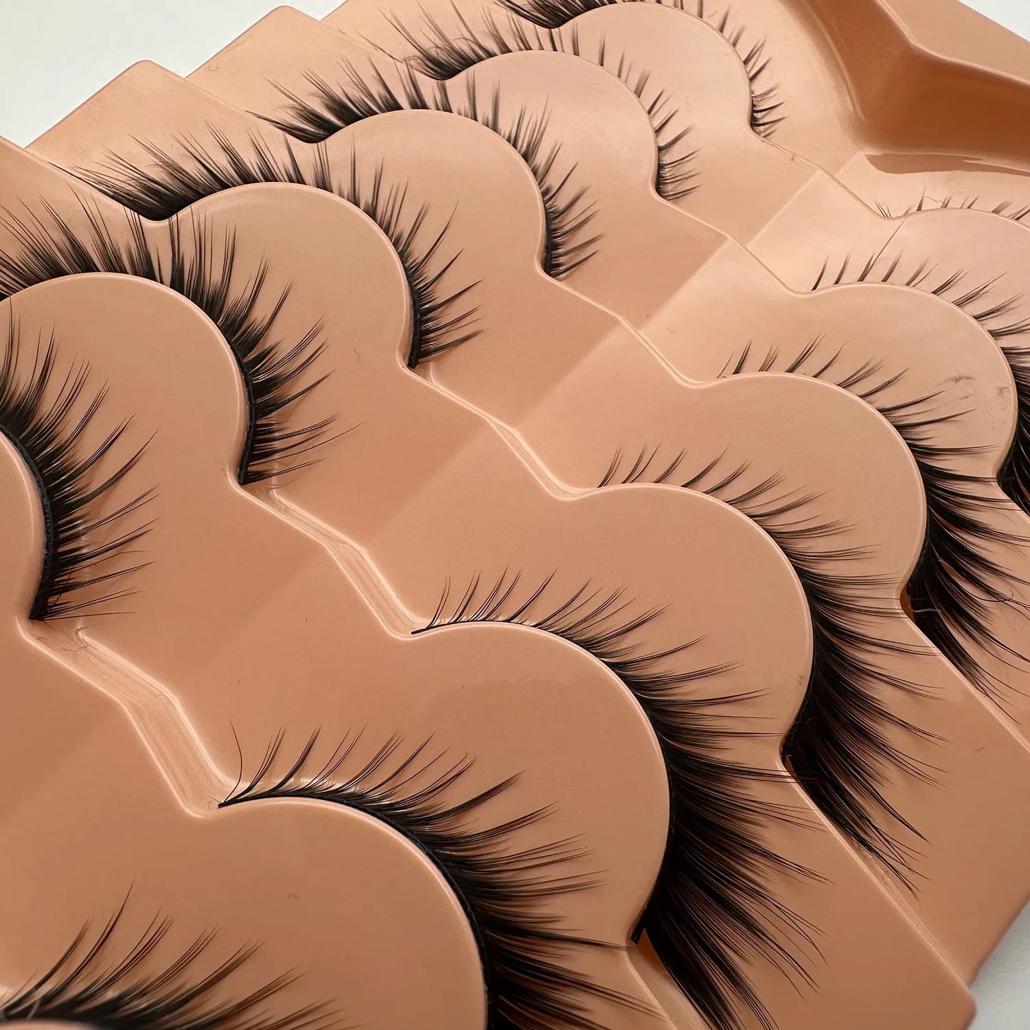 7 pairs of cat’s eye/fox eye falsie lashes one-piece design thick curled soft 3D fluffy mink lashes. — image 1